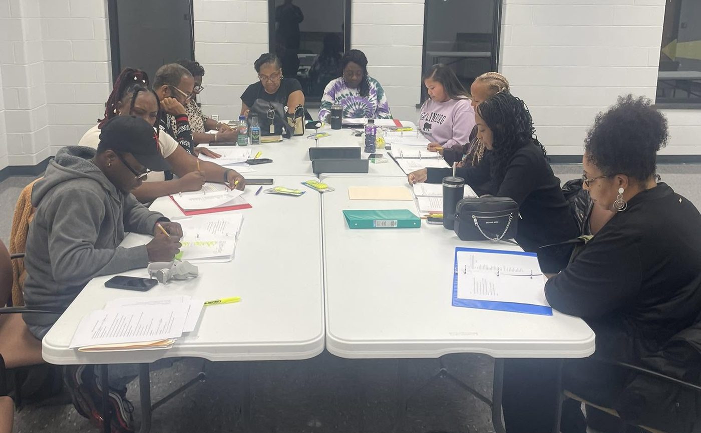 The Shine by JP cast gathered around the table for a first script reading