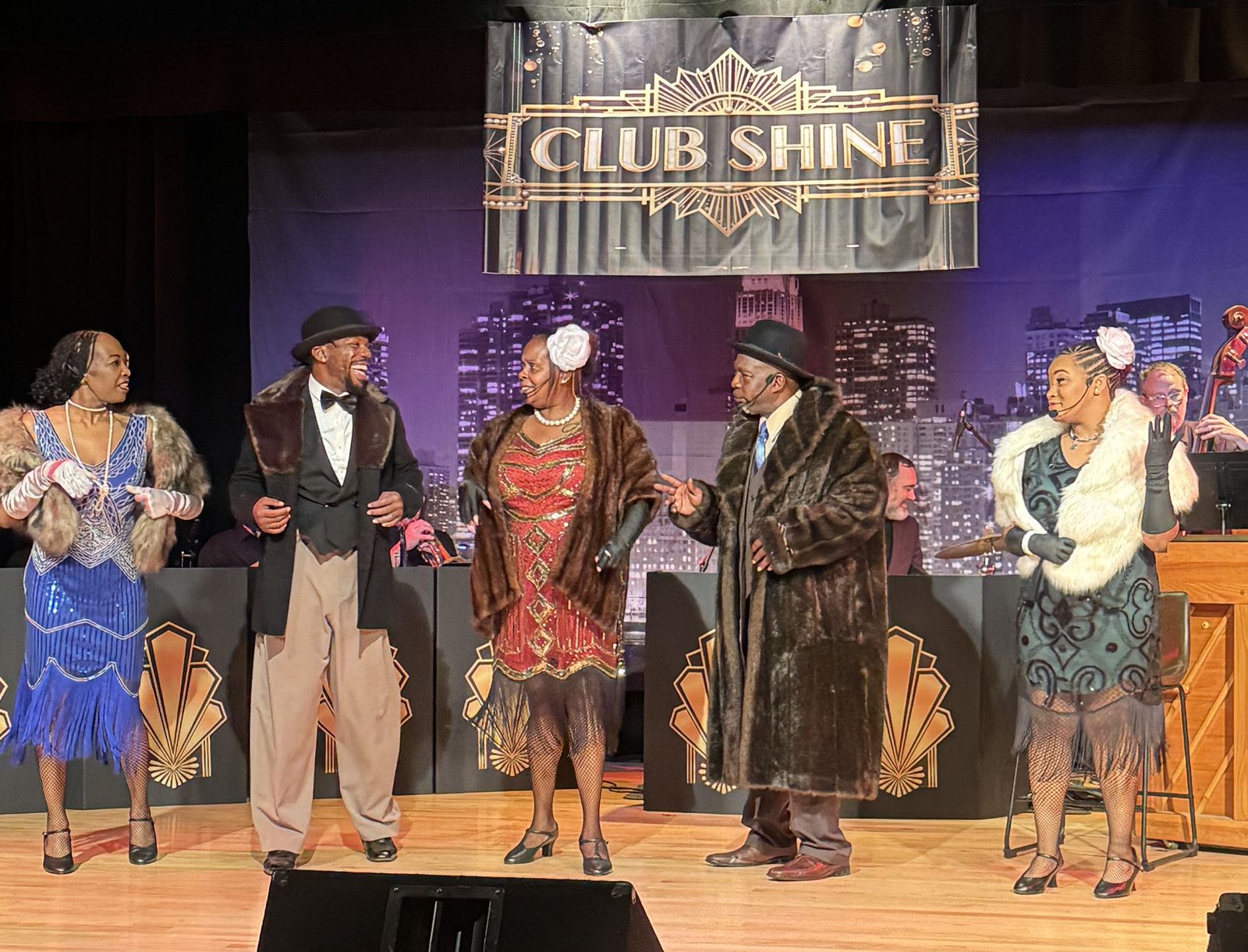 The cast of Ain't Misbehavin' performing on stage at Club Shine